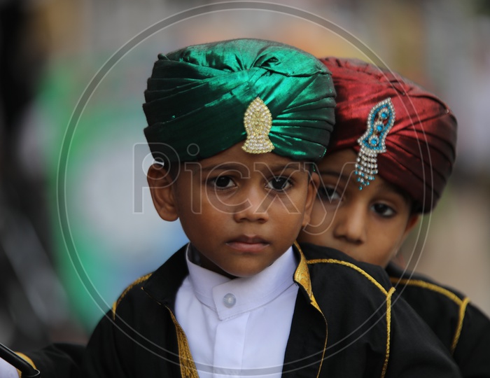 Muslim Kids Wearing  Turban Caps With Smile Faces And Posing  During Ramzan  Ramdan Festival