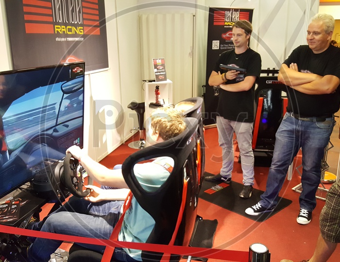Gamer's using  racing simulator for Playing Games