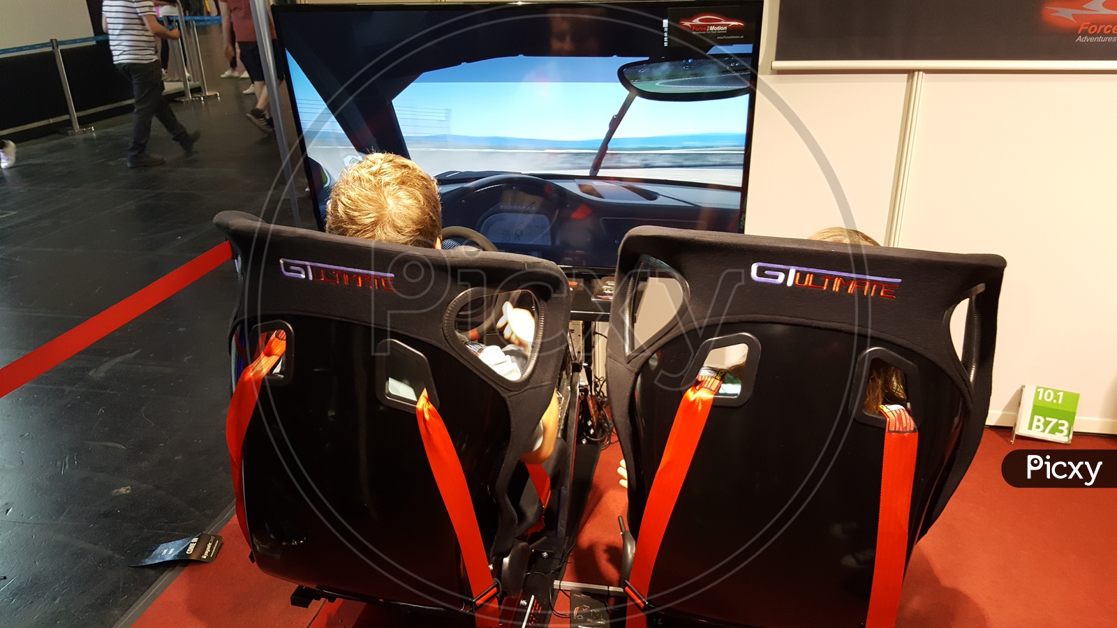 Gamer's using racing simulator for Playing Games