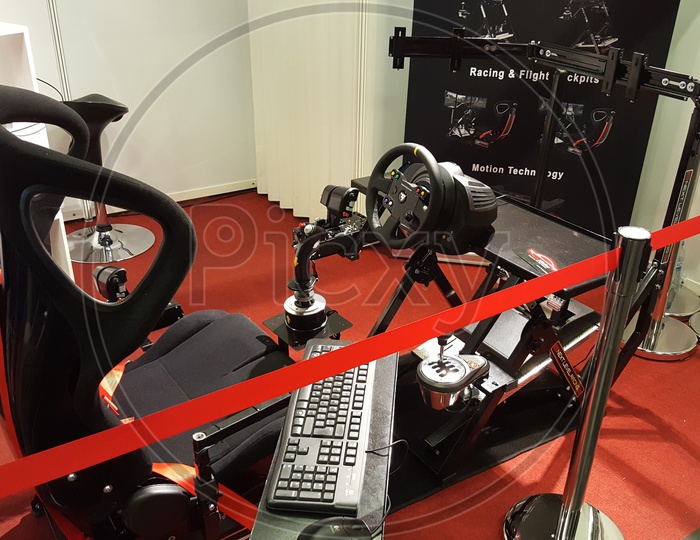Racing simulator with steering wheel and gaming chair for Gamer's