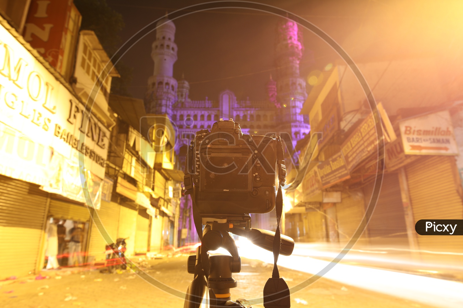 DSLR Camera To a Tripod On the Roads Of Charminar