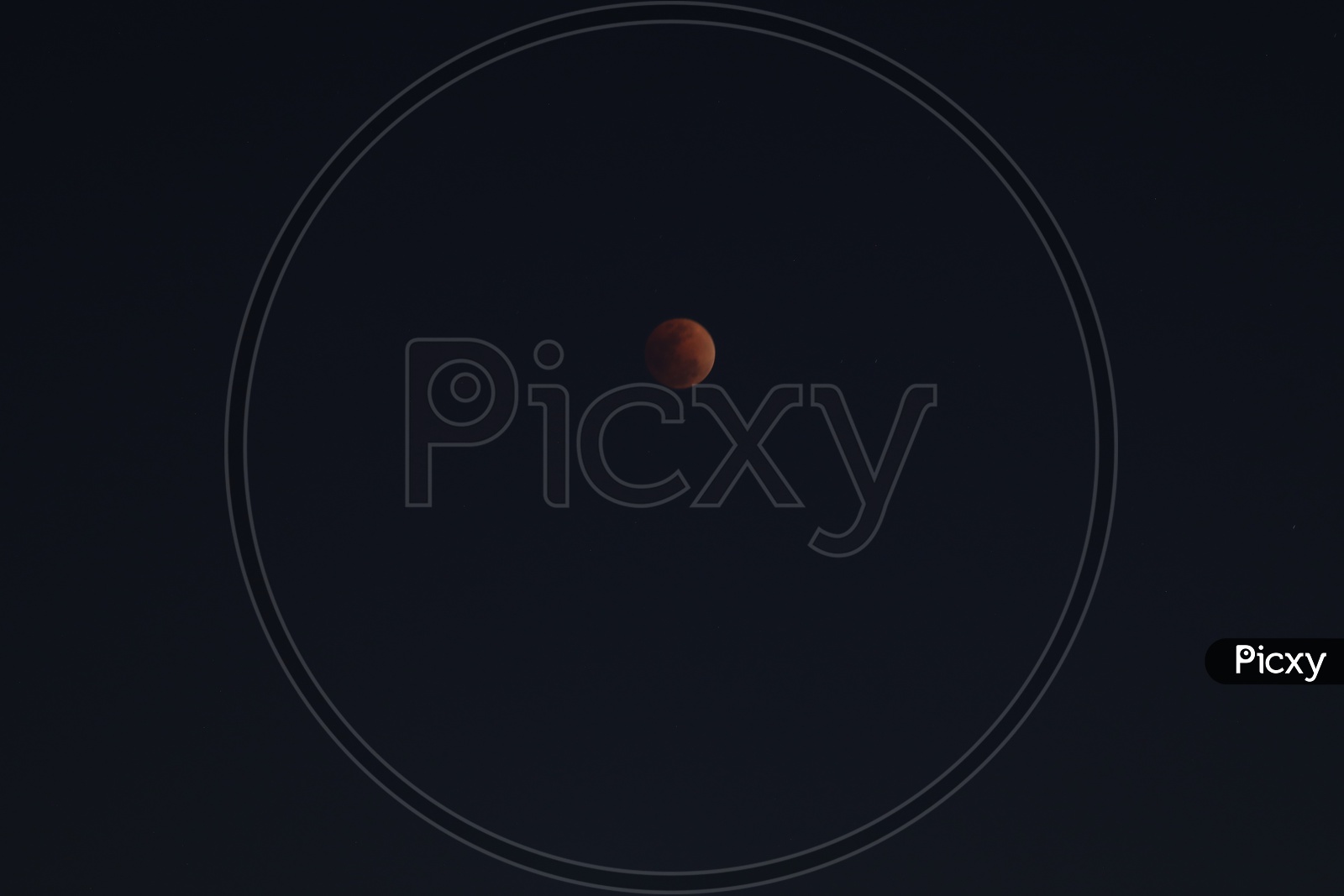 Eclipse Moon  Blood red Moon Isolated On Dark Sky