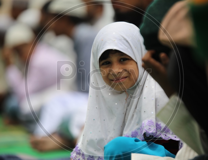 Muslim Girl Performing  Namaz Prayers At Jama Masjid During  Ramzan Ramdan  Festival