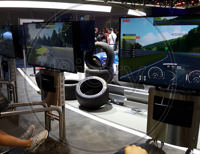 Gamer's Playing Car racing game at PlayStation Stall , gamescom