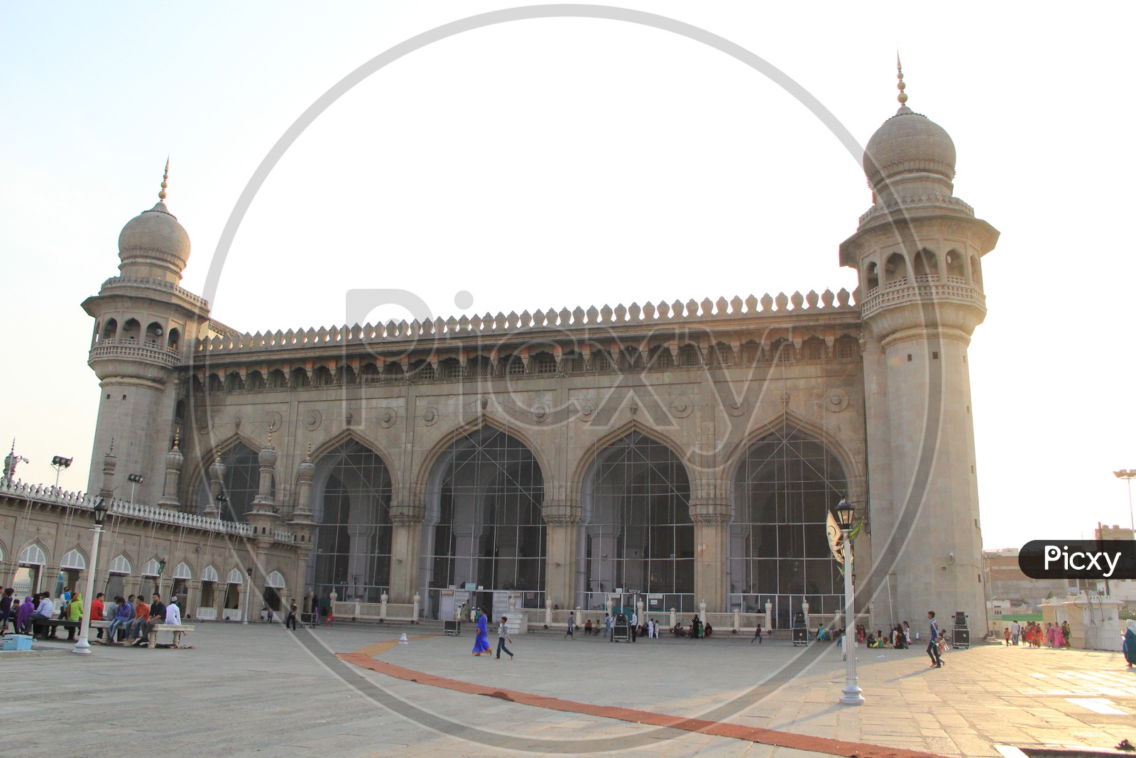 Mecca Masjid With Visitors