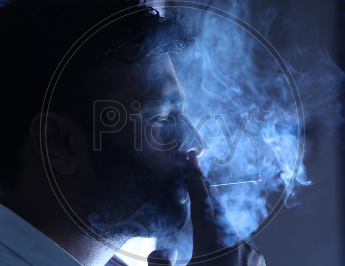 Indian Man  Smoking Cigarette