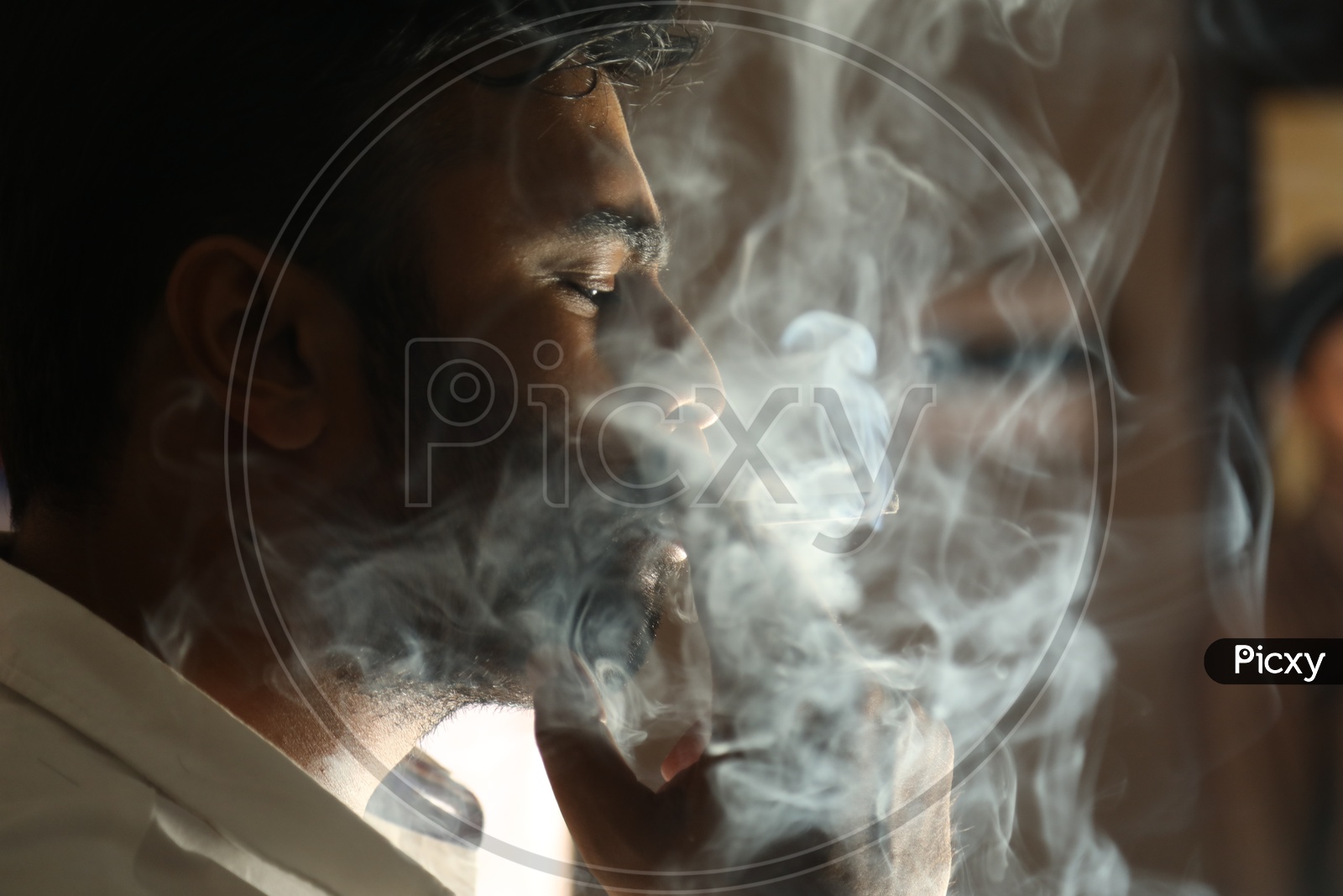 Man Smoking a Cigarette