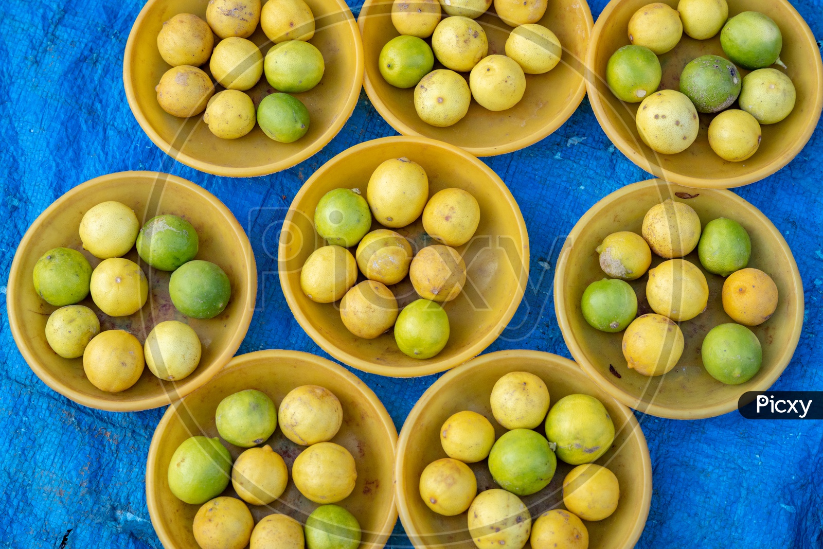 Lemons  in Bowls At a Vegetable Vendor Stall