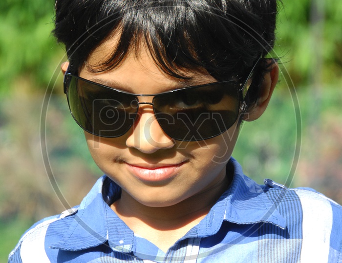 young Boy Posing On Outdoor