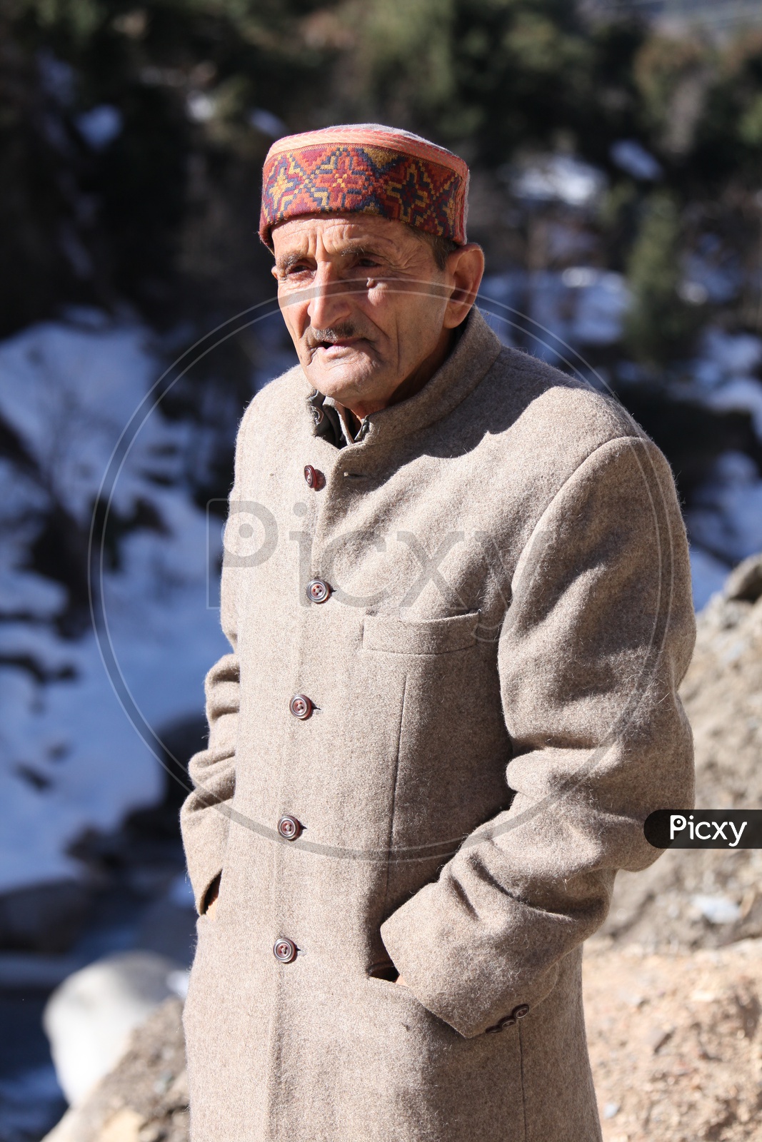 An Old Man in Kashmir With Woolen Clothes