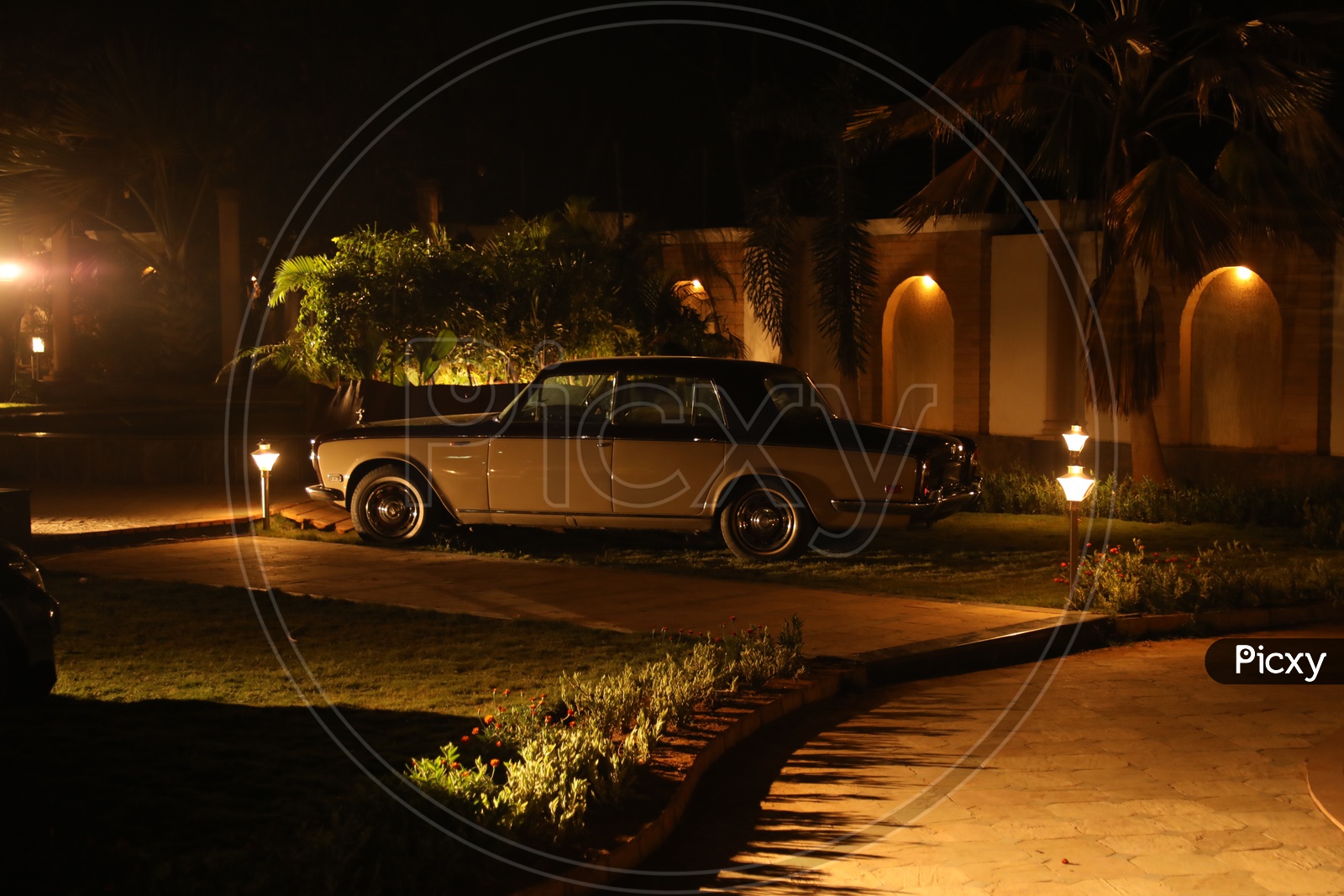Antique Car Parked In a House Lawn