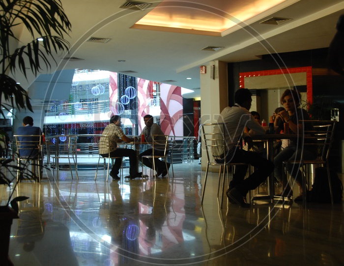Food Court With Table And Chairs In a Mall