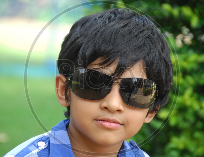 Indian Young Boy With an Expression On Face And Posing On Outdoor