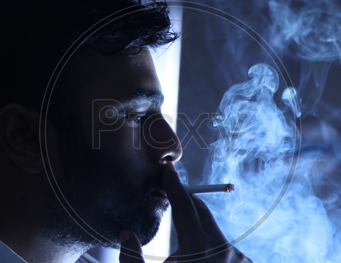 Man Smoking a Cigarette