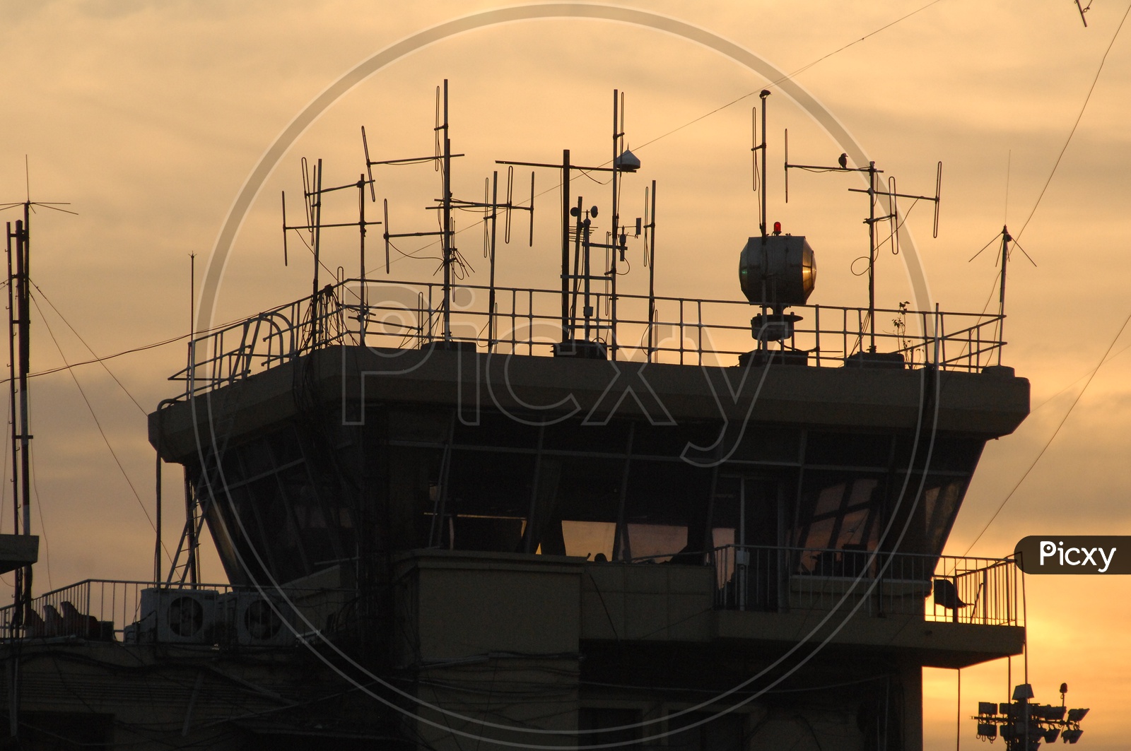 Silhouette Of Air Traffic Controller  Tower In a Airport
