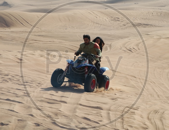 Desert Safari Quad Bikes on Desert Sand dunes