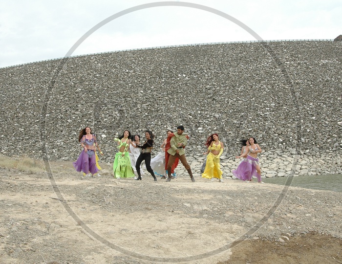 Dancers Dancing At Sedimentary Rock  Dunes  For a movie Shooting
