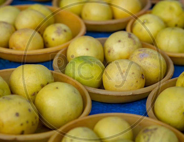 Lemons  in Bowls At a Vegetable Vendor Stall
