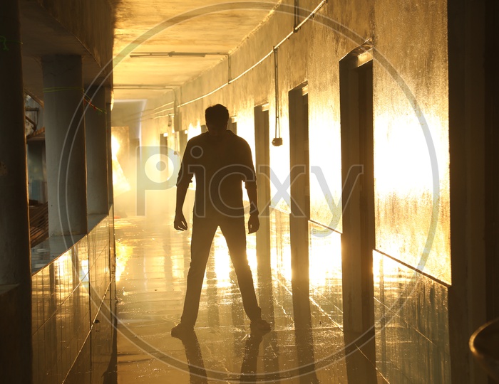 Silhouette Of a Man In Corridor