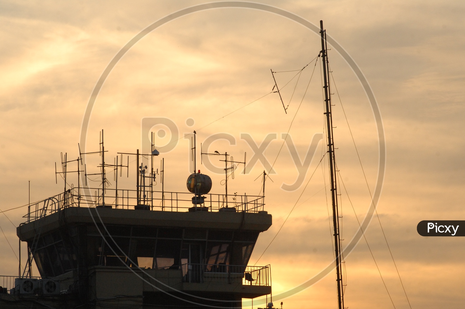 Silhouette Of Air Traffic Controller  Tower In a Airport