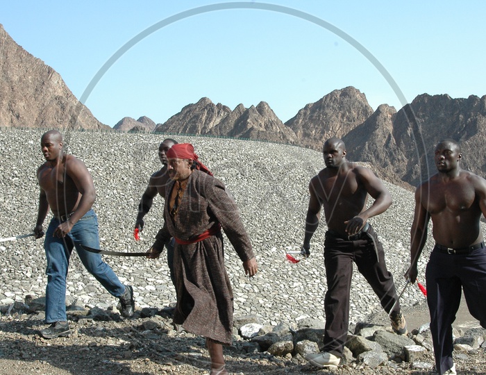 Goons With Swords At Sedimentary Rock Hills For a Movie Shoot