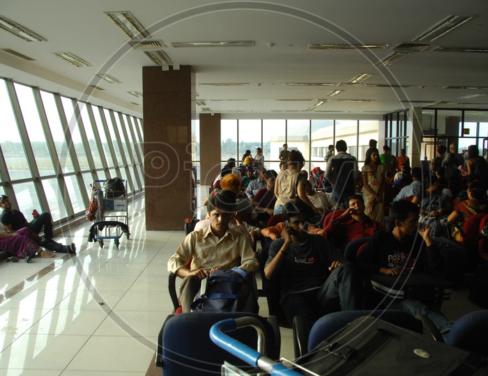 Passengers Waiting In an Airport Waiting Lounge