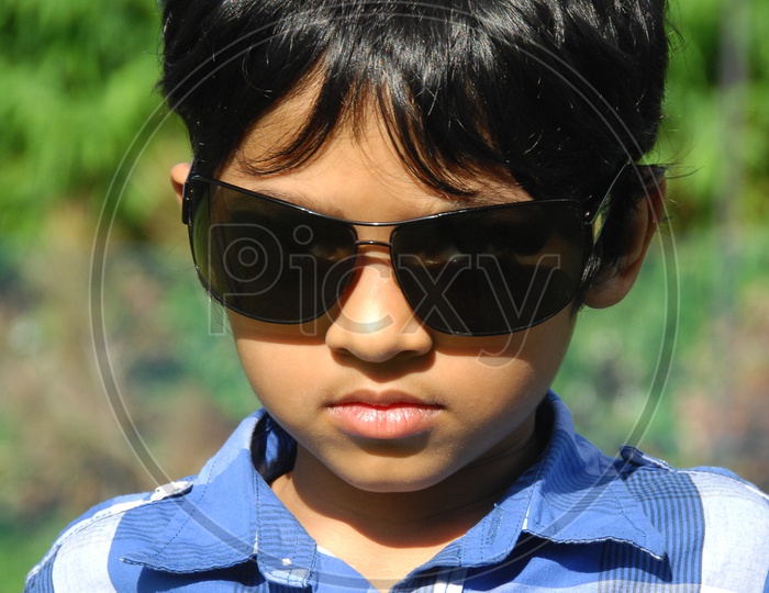young Boy Posing On Outdoor