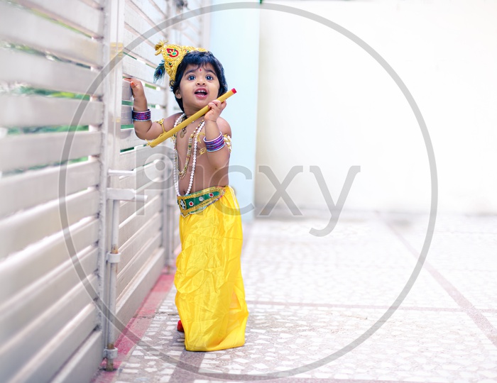 Conceptual Photography.Kid Dressed up as Krishna.