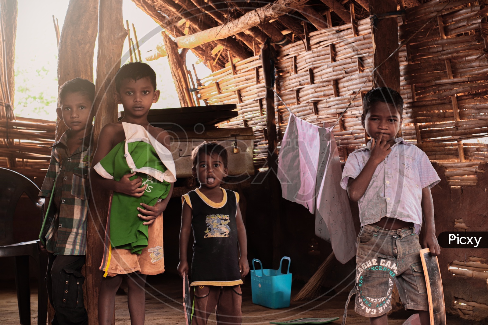 Indian Tribal Children In Rural Tribal Village Houses