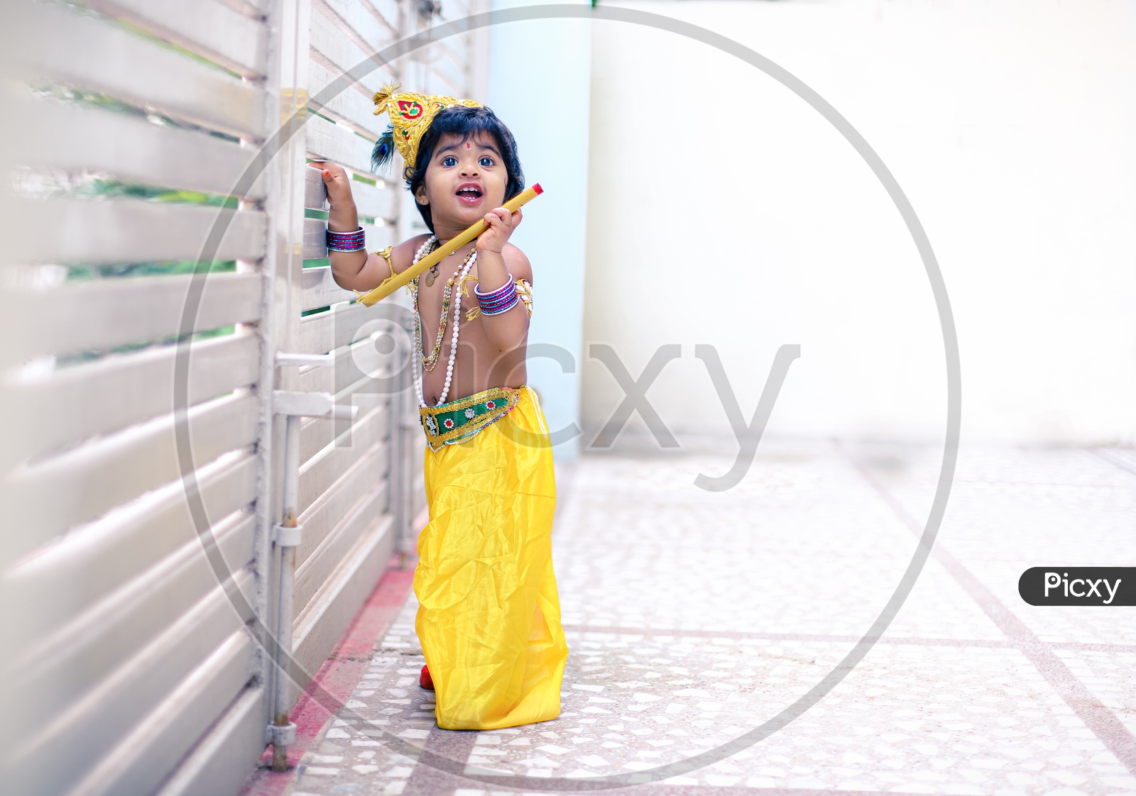 Conceptual Photography.Kid Dressed up as Krishna.