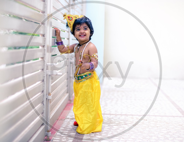 Conceptual Photography. Kid Dressed up as Krishna.
