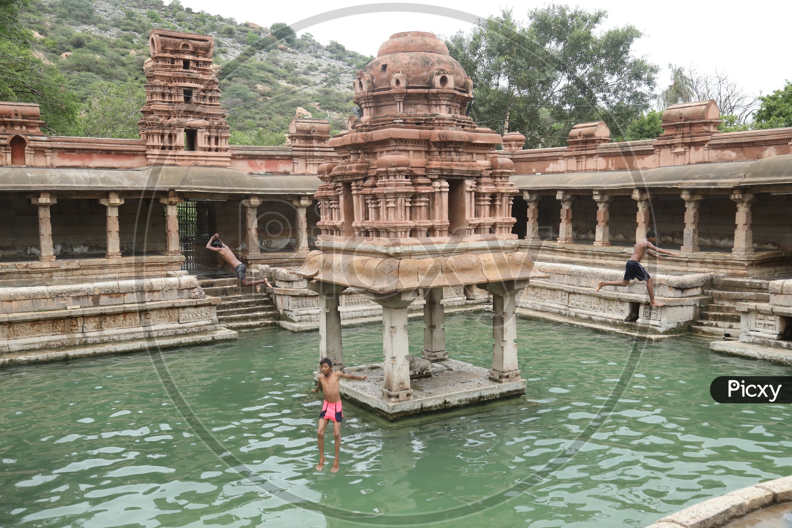 Young Boys Taking Dive Into Temple Tanks At Yaganti Sri Uma Maheshwara temple