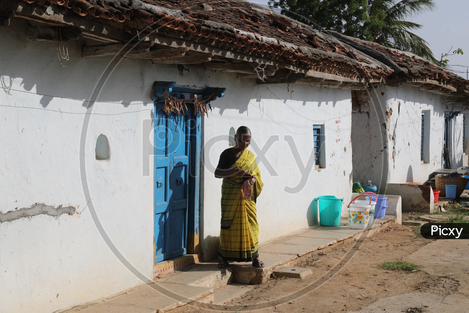 Image of An Old Woman In a House Of Rural Village-ZU185137-Picxy