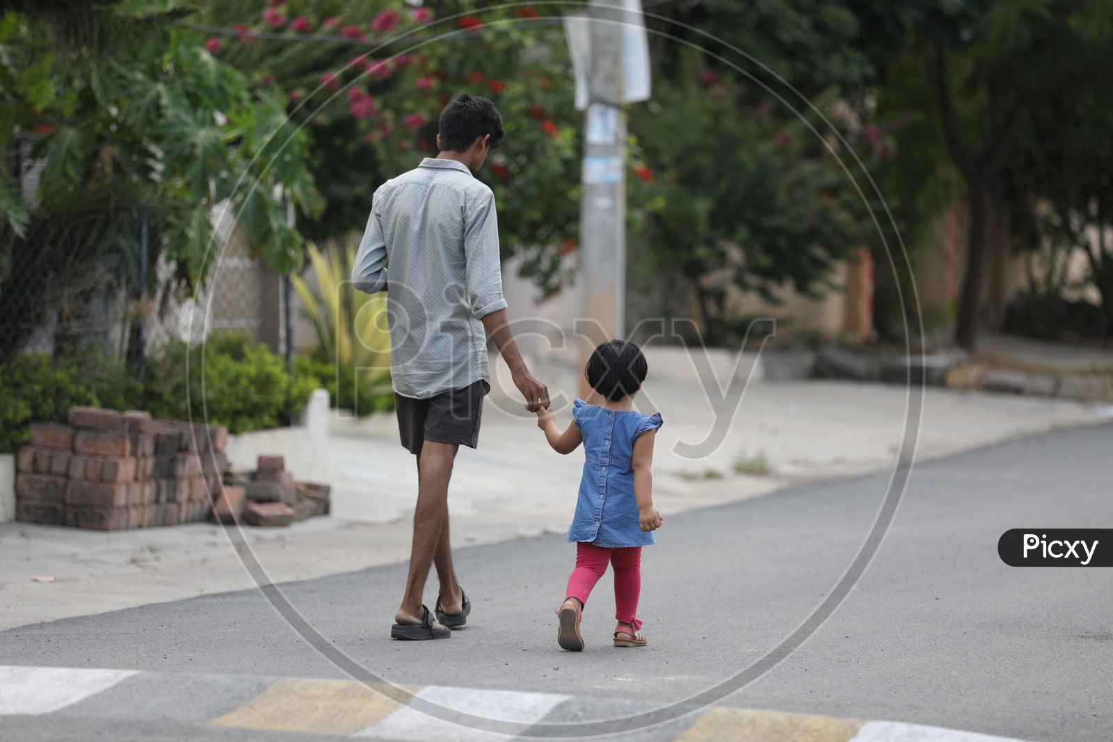 A Brother Walking With  His Sister Or Girl Child  On Roads