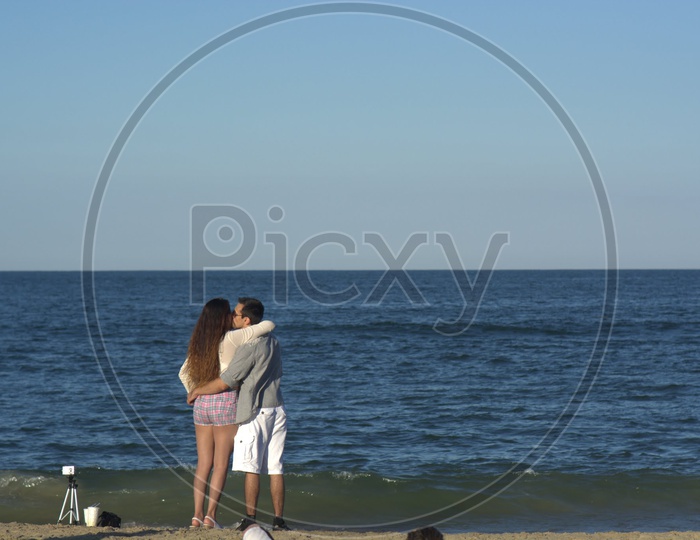 Couple Kissing On a Beach