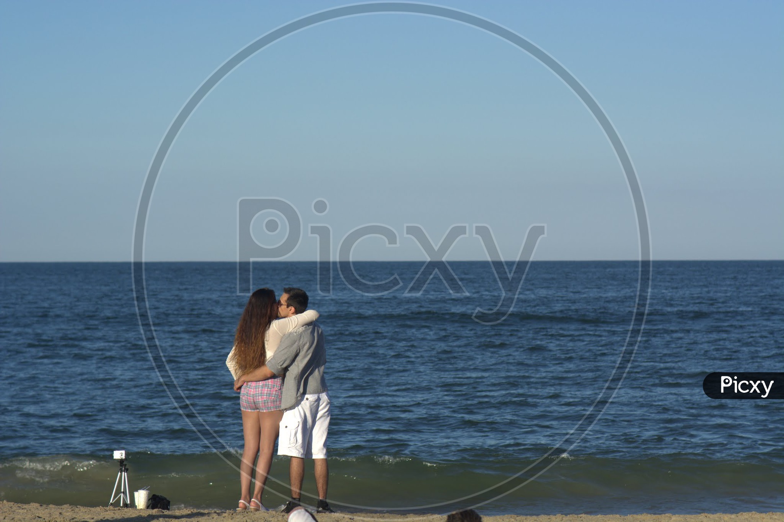 Couple Kissing On a Beach