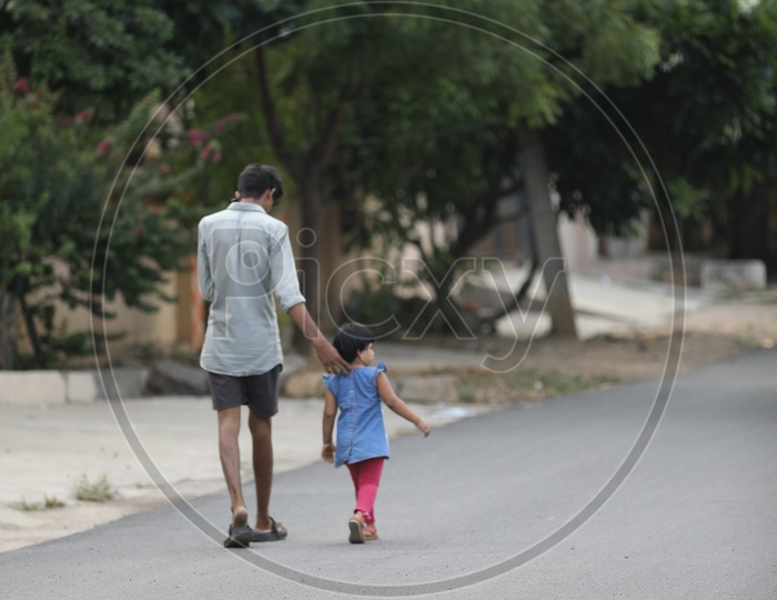 A Brother Walking With  His Sister Or Girl Child  On Roads