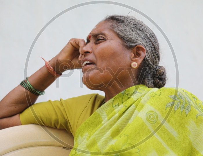 Indian Old Woman Of a Rural Village Speaking With Expressions Closeup