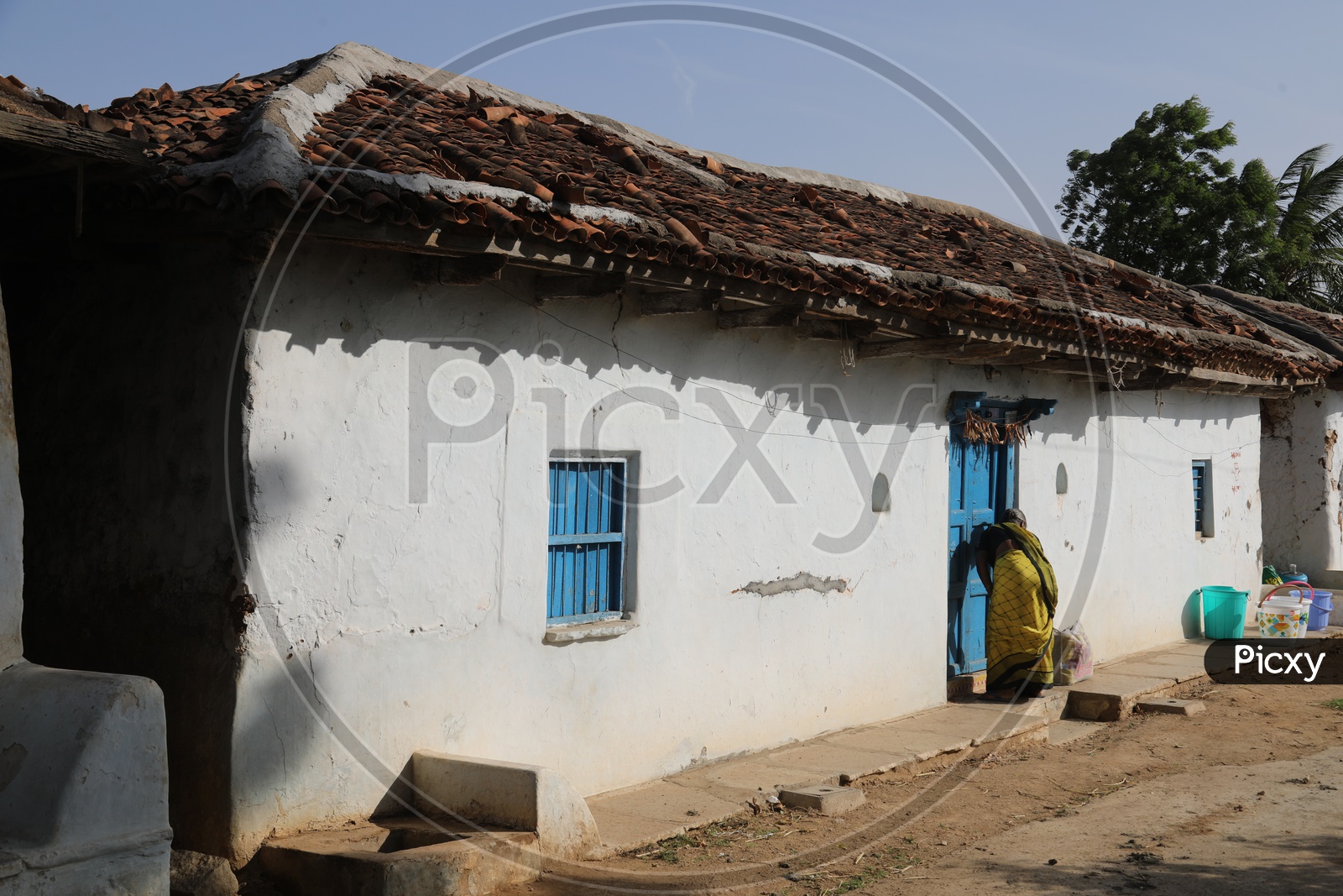 An Old Woman In a House Of Rural Village