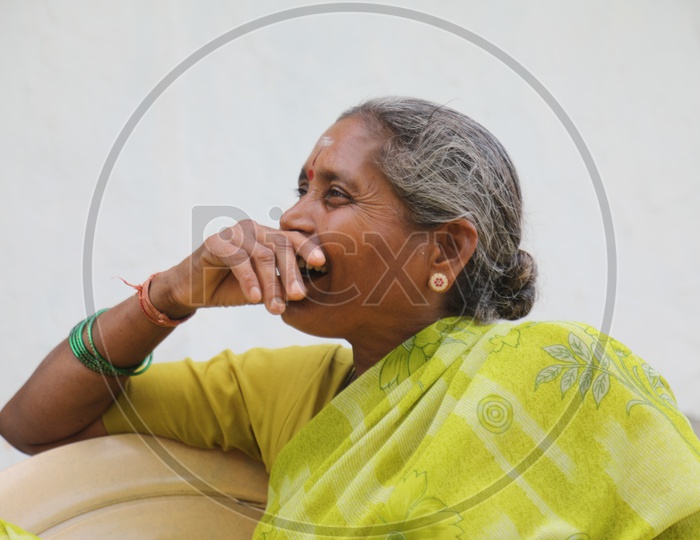 Indian Old Woman Of a Rural Village Speaking With Expressions Closeup