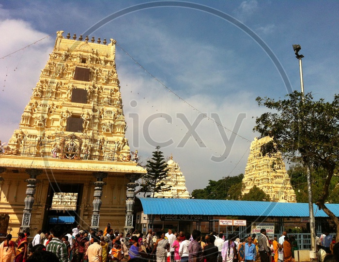 Devotees At The Premises Of Dwaraka Tirumala  With A View of Temple Shrine
