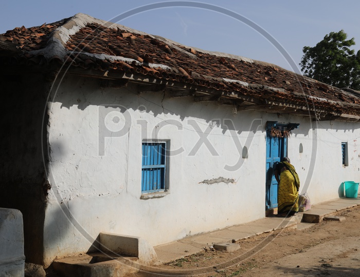 An Old Woman In a House Of Rural Village