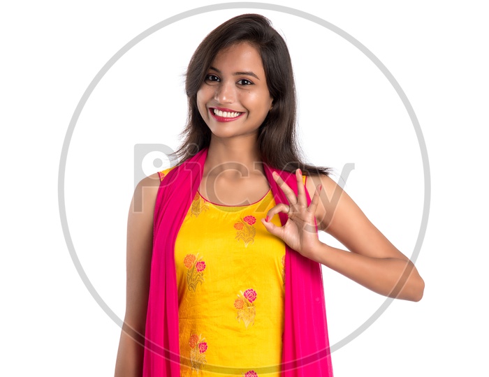 Young Indian Girl or Woman With Happy Positive Gestures And Smile Expressions Posing On an Isolated  White Background