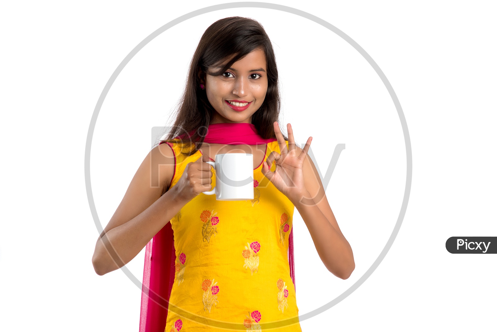 Young Indian Woman or Girl Holding or Drinking  coffee  in a Cup And Posing on an Isolated White Background