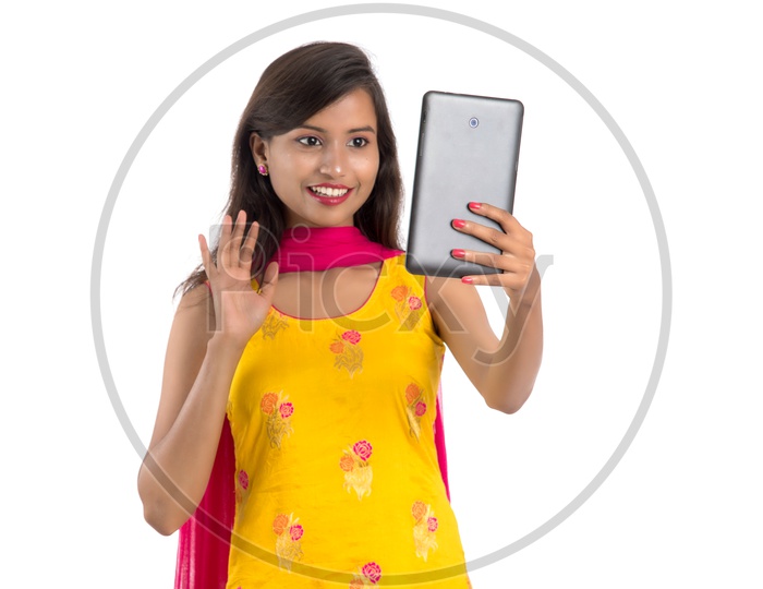 Young Indian Girl or Woman Speaking in a  Video Call   With an Expression On an Isolated White Background