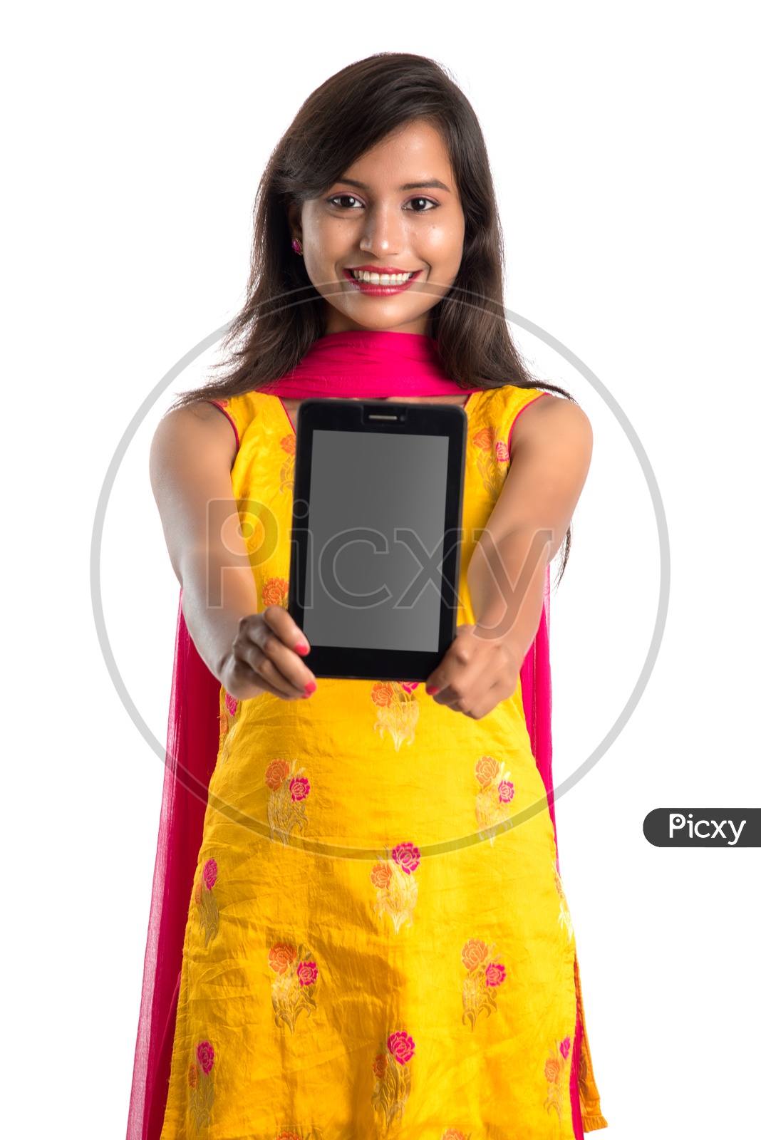 Young Indian Girl or Woman Showing Tab Or Tablet Gadget Empty Screen  With an Expression On an Isolated White Background