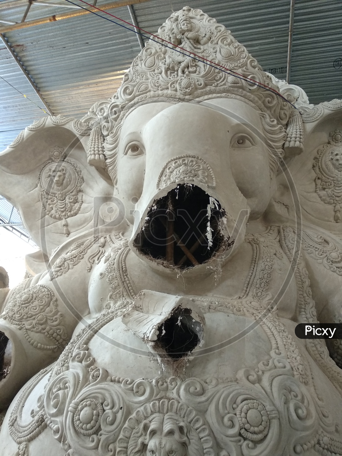 Prepartion of Ganesh Idol for Ganesh Chathurthi. Idol out from Mould and ready to get attached with hands