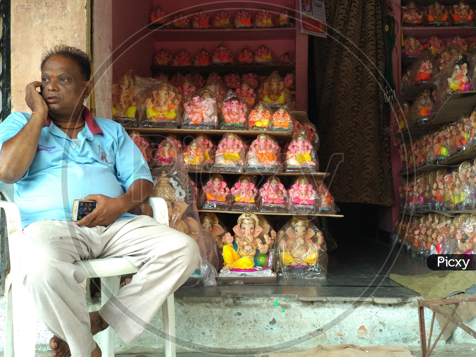 Street Vendor getting ready to sale Ganesh Idol's at dhoolpet