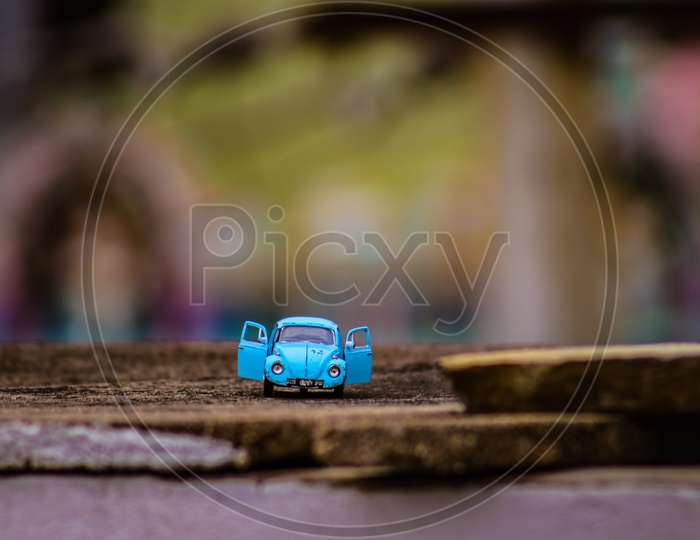 Little blue volks wagon beetle toy car.