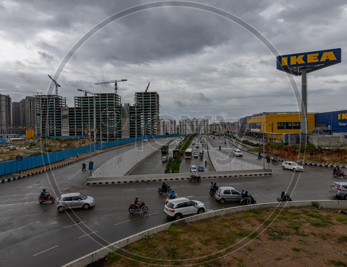 Commuting Vehicles on Flyover Above The Mindspace Madhapur Center  With A View Of IKEA